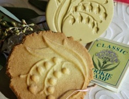 Butter cookies with a floral design on top.