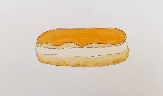 Watercolor painting of a vanilla éclair dessert.