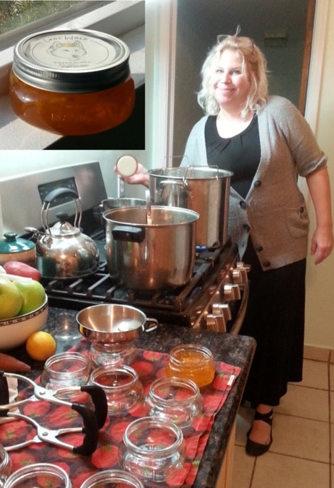 Woman cooking in a kitchen with various ingredients on the counter.