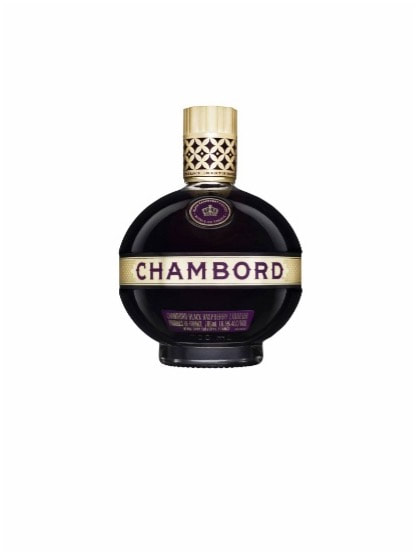 A round bottle of Chambord black raspberry liqueur with a gold cap.