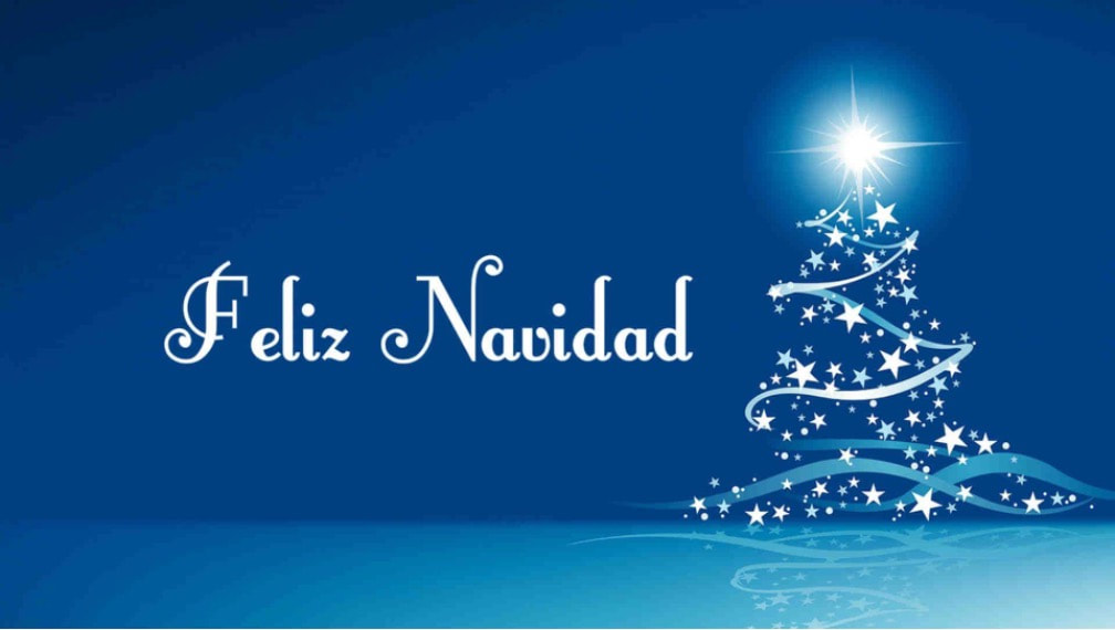 Elegant blue Christmas card with a white glowing tree and 'Feliz Navidad' text.