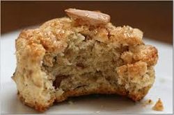 A close-up of a partially eaten oatmeal cookie.