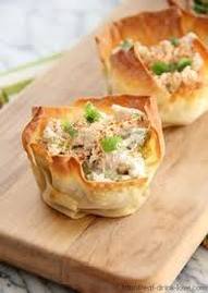 Savory chicken and broccoli cups in crispy pastry shells.