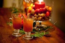 Festive autumn cocktails with candlelit decor and seasonal fruits.