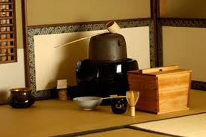 Traditional Japanese tea ceremony setup with utensils.