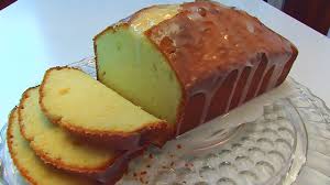 Sliced loaf of golden-brown pound cake.