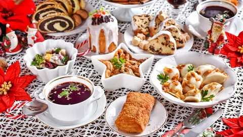 A festive table with traditional Easter foods and a decorated cake.