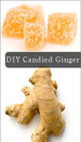 Candied ginger pieces and fresh ginger root on a white background.