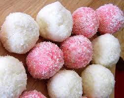 Pink and white sugar-coated sweet balls.