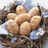 Honeycomb-shaped cookies arranged on a cloth in a nest.