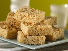 Stack of crispy rice treats on a plate.