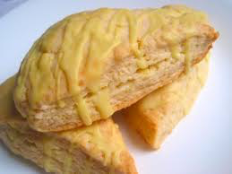 Close-up of sliced yellow melon with textured rind.
