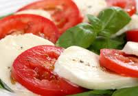 Fresh Caprese salad with tomato, mozzarella, and basil.