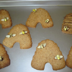 Homemade cookies with small popcorn pieces on top.