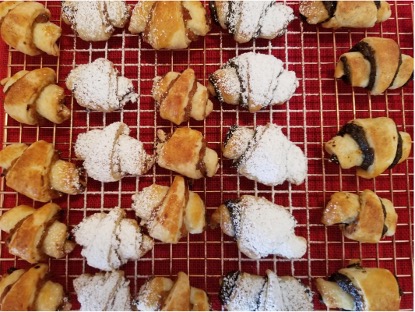 Mini pastries on a red cooling rack.